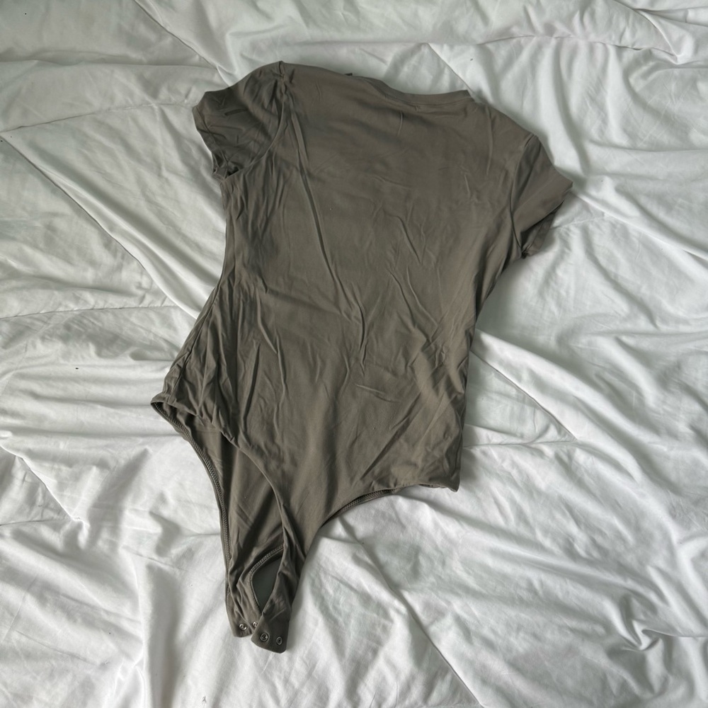 Pumiey gray bodysuit top smooth medium (deodorant marks come out)